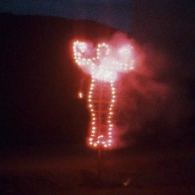 Silhouette of a woman on fire