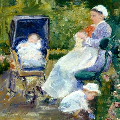Woman sitting on a park bench with her young children