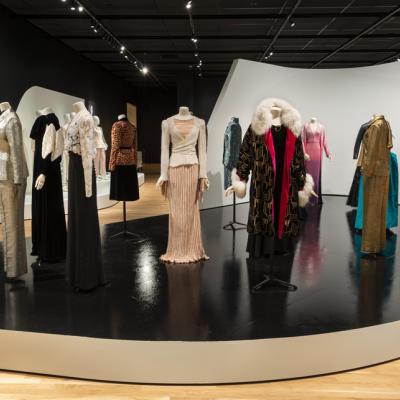 Interior shot of the Suited gallery with mannequins displaying various garments
