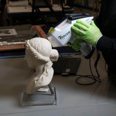 Analyzing the paint sample with a handheld XRF spectrometer