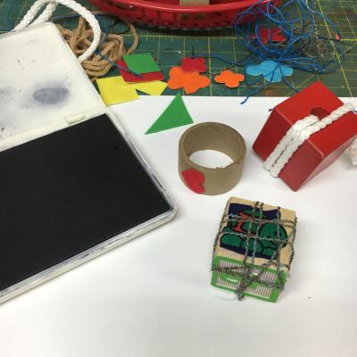 Ink pad and stamps laid out for artmaking