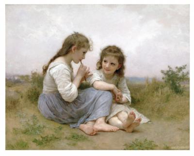 Two children sitting in the grass