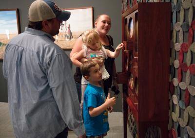 A family of four enjoying the museum galleries