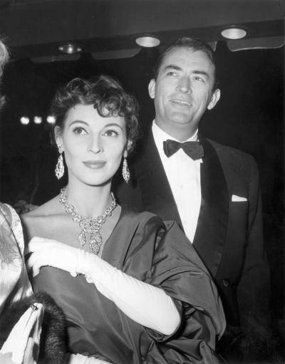Veronique and Gregory Pec arriving to a movie premiere in formal attire