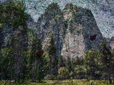 Textured photograph looking up toward castle-like rock formation perched above a foreground of trees