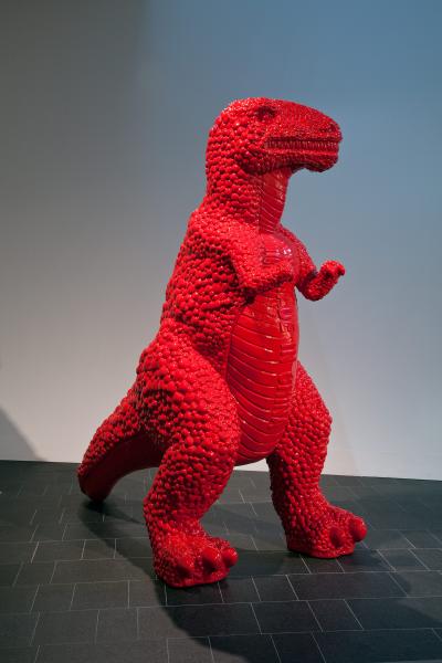 Red fiberglass life-size t-rex dinosaur