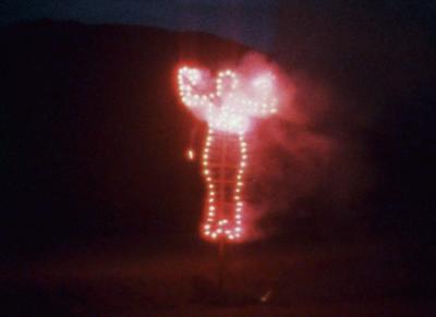 Silhouette of a woman on fire
