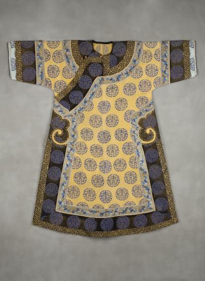 Heavily embroidered yellow silk robe.