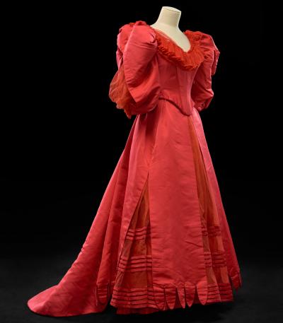 Red ball gown displaying on mannequin