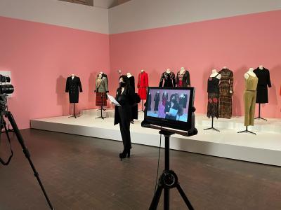 Jane Burke in the Paris to Hollywood exhibition being filmed for videos about the show