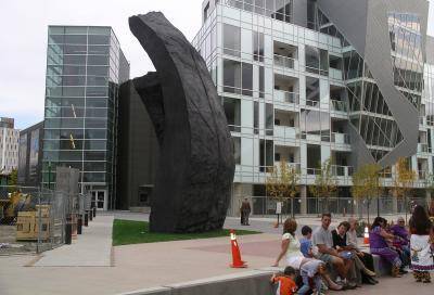 Tall monolithic outdoor sculptures in the museum plaza