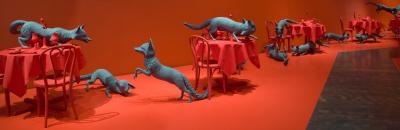 Several tables with several foxes