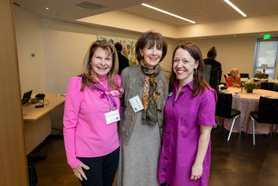 three women standing together for the camera
