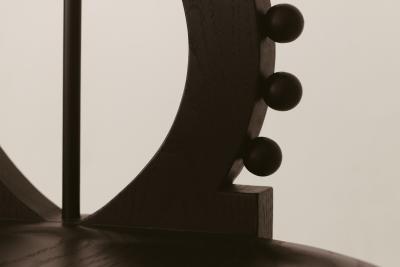 detail of curved back of chair