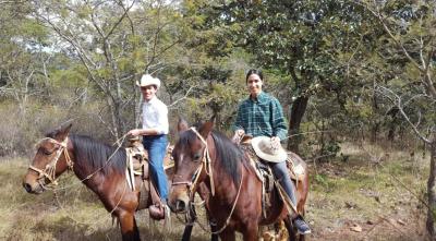 two people on horseback