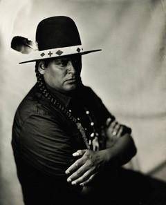 Black and white photo of artist Gregg Deal