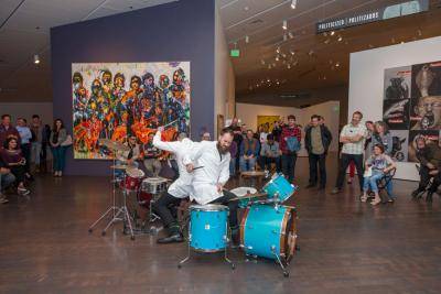 Adán De La Garza and Ryan Wade Ruehlen performing on drums in the Stampede gallery at the 2018 Materials Frequency Untitled Final Friday event.