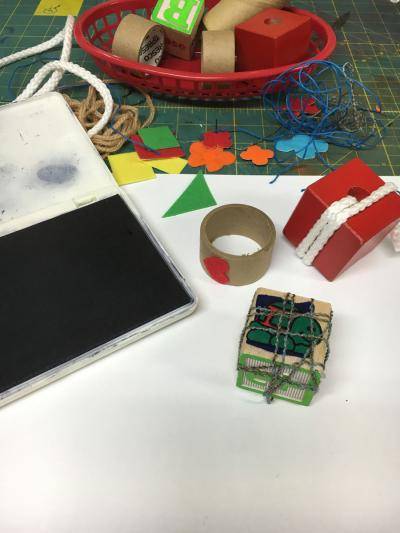 Ink pad and stamps laid out for artmaking