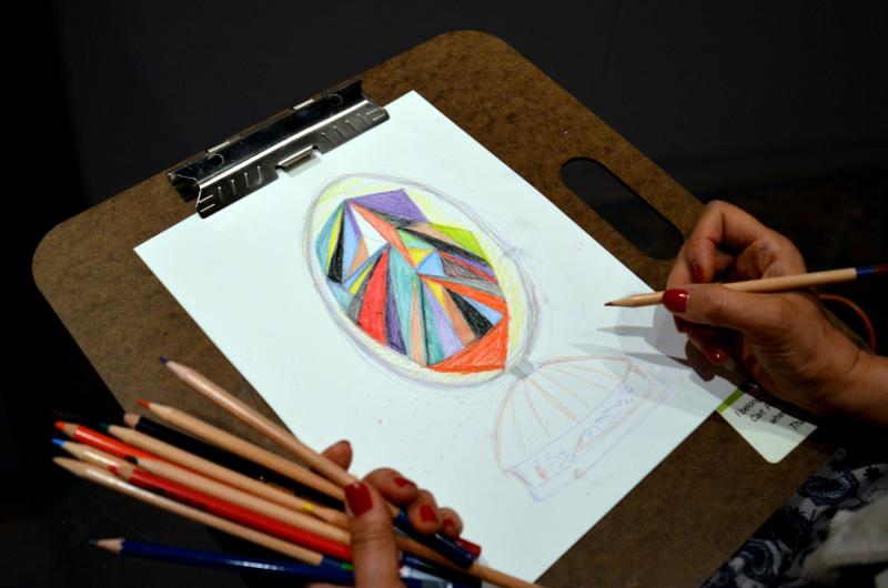 Person drawing at the Denver Art Museum