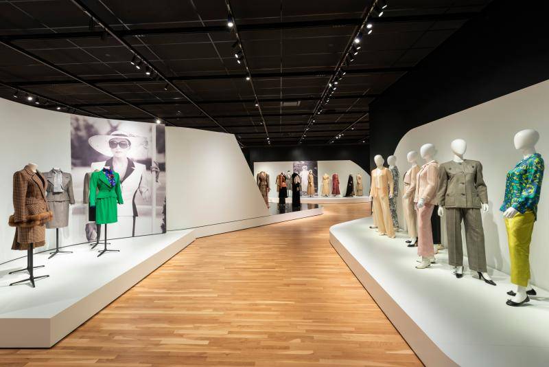 Interior shot of the Suited gallery with mannequins displaying various garments