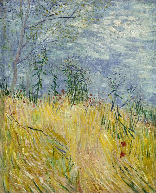 Van Gogh painting of yellow wheat fields against a blue sky.