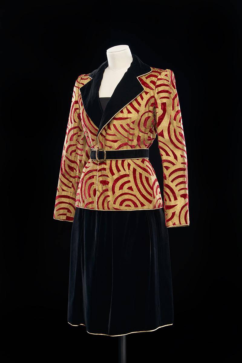 Velvet patterned suit coat and black skirt