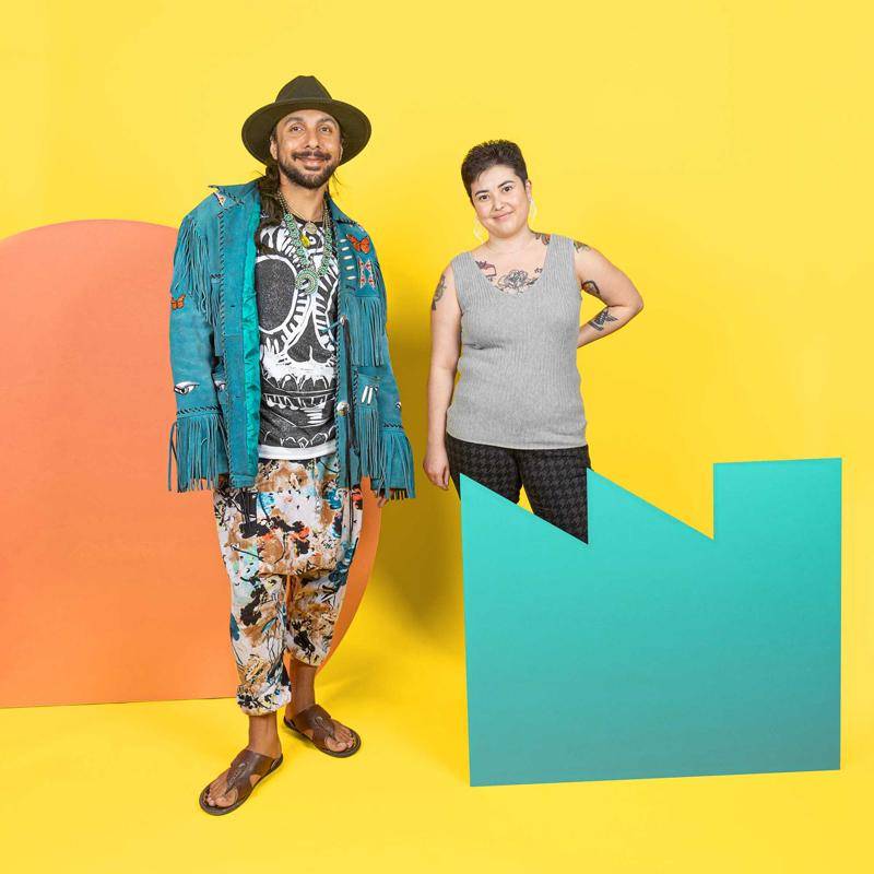 Artists Cal Duran and Sarah Fukami posing together