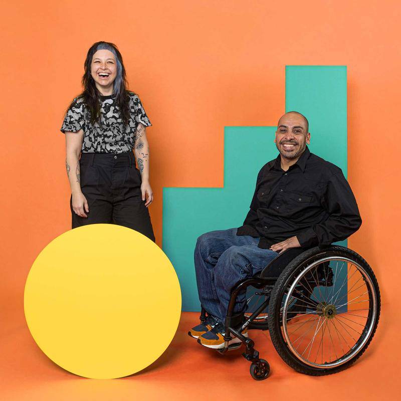 Artists Sam Grabowska and Javier Flores posing together