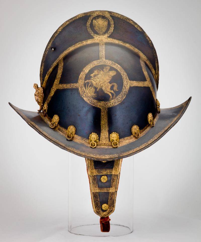 Helmet with a pointed broad brim made out of blackened steel with etched decorations