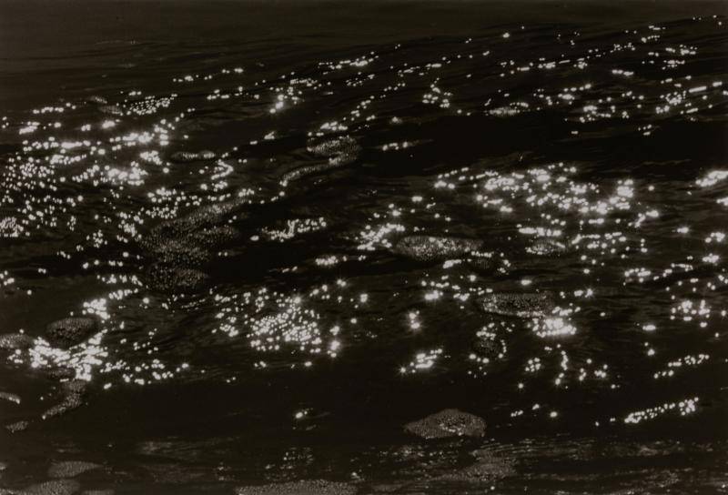 Dark silver print of the sea at night