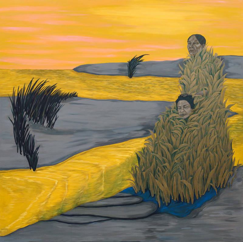 Two figures covered in grass in a bright yellow field