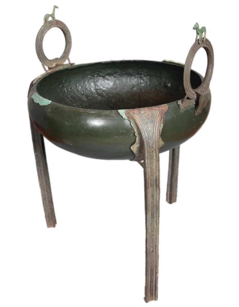 Bronze bowl supported by three legstands, with two ring handles at the side