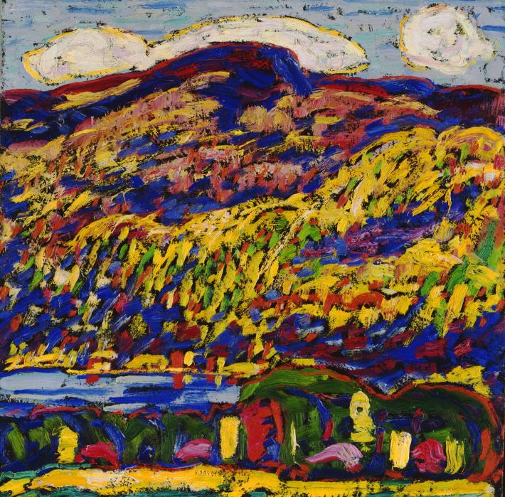 Impressionistic landscape of a mountain scape populated by bright fall colors and changing leaves