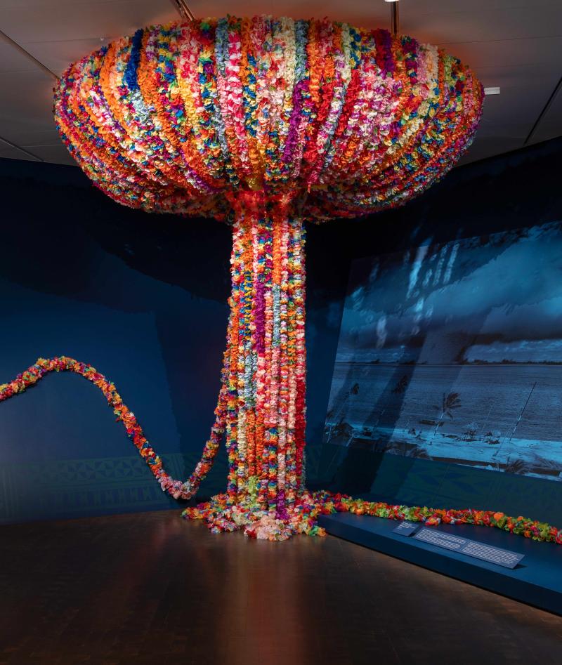Gallery view of a colorful installation made to resemble a bomb explosion