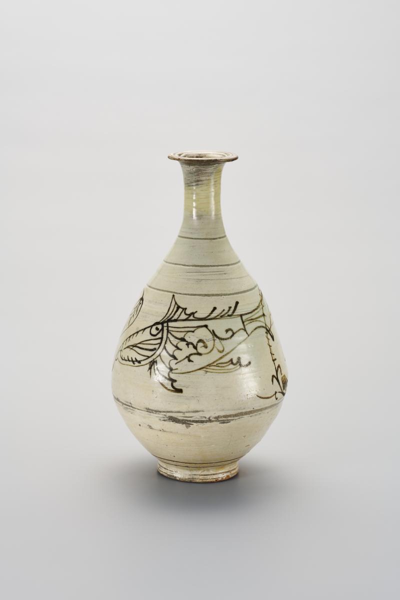 Japanese bottle with fish decorations
