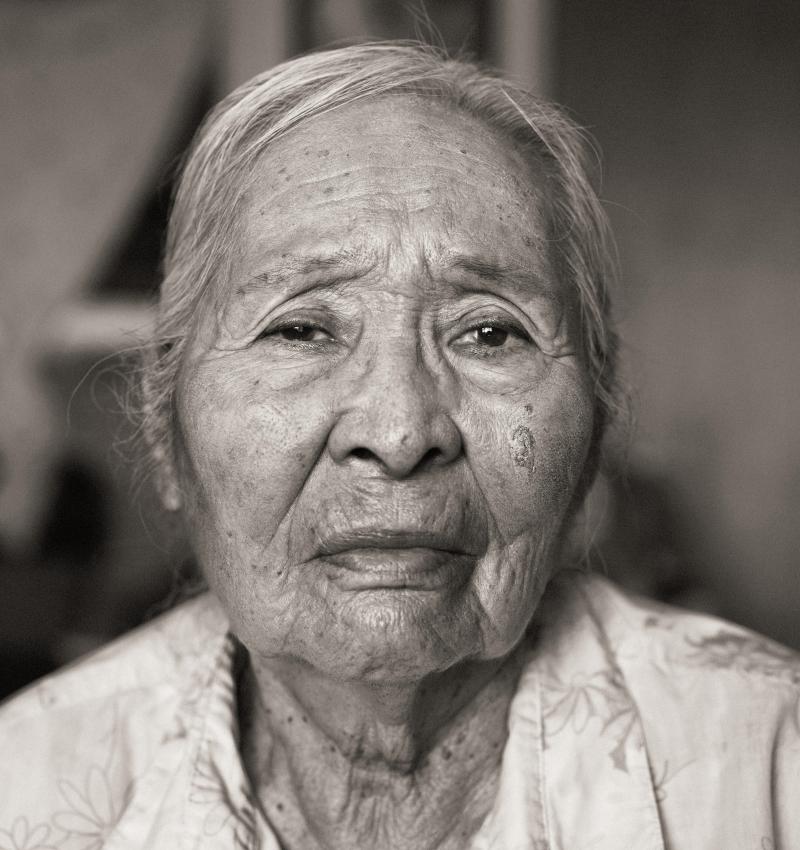 Black and white photograph of an elder Navajo woman