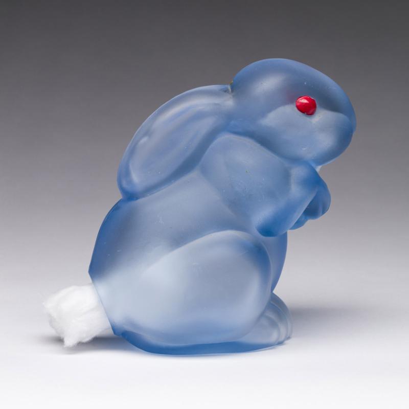 Light blue dispenser shaped like a small rabbit