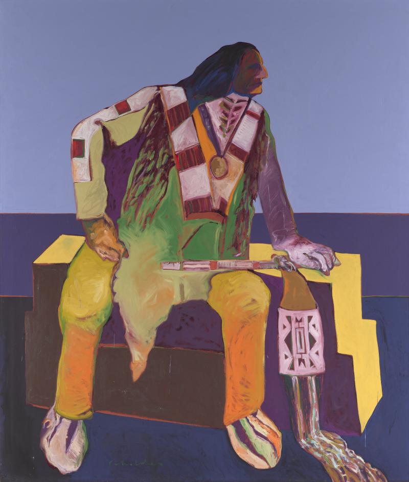 Side profile of a Native American man sitting and leaning forward on a bench