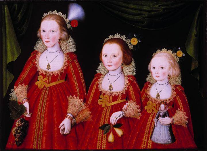 Image of three young girls wearing identical red dresses with lace trim and tall lace collars. Each girl holds something different in her hand: grapes, pears, and a doll, respectively.