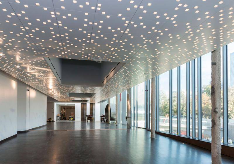 photo of Duncan Hall showing the hallways bright windows and lighted ceiling