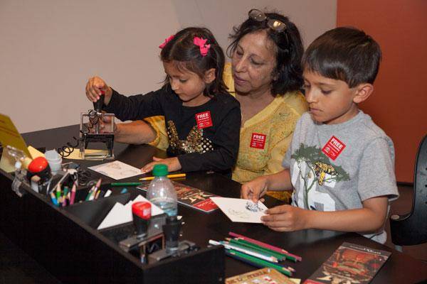 Family artmaking at the Denver Art Museum on Free First Saturday.